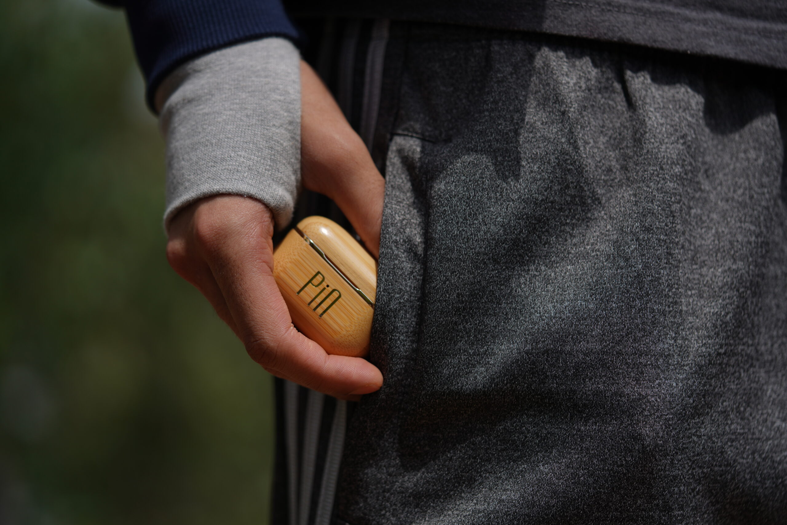 The PIN: Luxury Wooden Earbuds With Built-In AI Translation